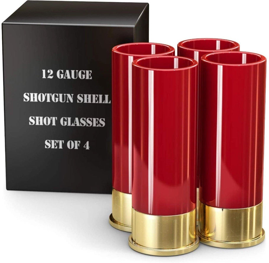 A set of four red 12 gauge shotgun shell-shaped shot glasses, displayed in front of their black packaging that reads '12 Gauge Shotgun Shell Set of 4'.