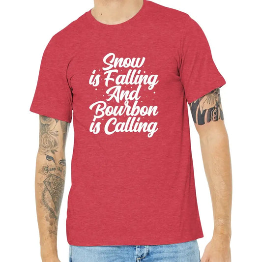 Model wearing a red t-shirt with 'Snow is Falling And Bourbon is Calling' text, ideal for bourbon shirts enthusiasts.