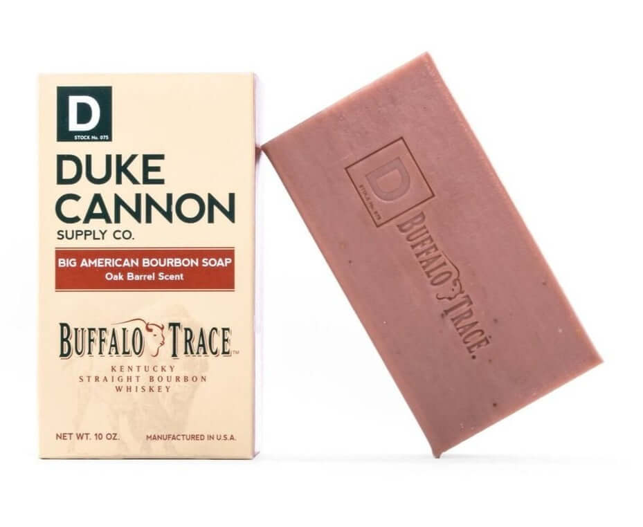 Duke Cannon Soap Big American Bourbon Soap box and bar with oak barrel scent next to it.