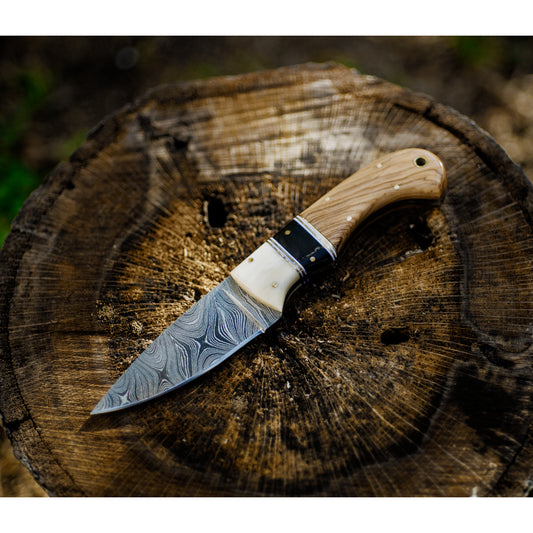 Olive Wood And Bone Skinner